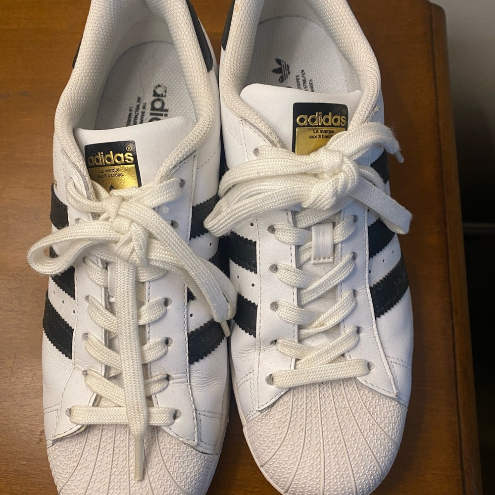 Adidas White and Black Shoes with Gold Details